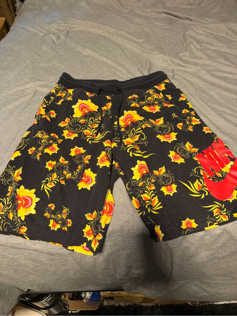Nike Men’s Black Athletic Shorts with Yellow & Red Floral Design